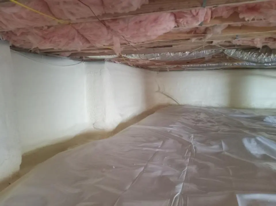Crawl space encapsulation with closed-cell spray foam for Commercial Roof Restoration in Rockland